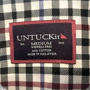 Men’s long sleeve button down from Untuckit 
Barely worn Great checkered pattern
